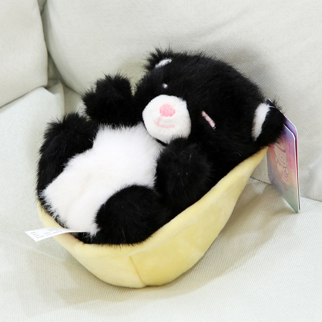 Peluche bébé animal dans un berceau
