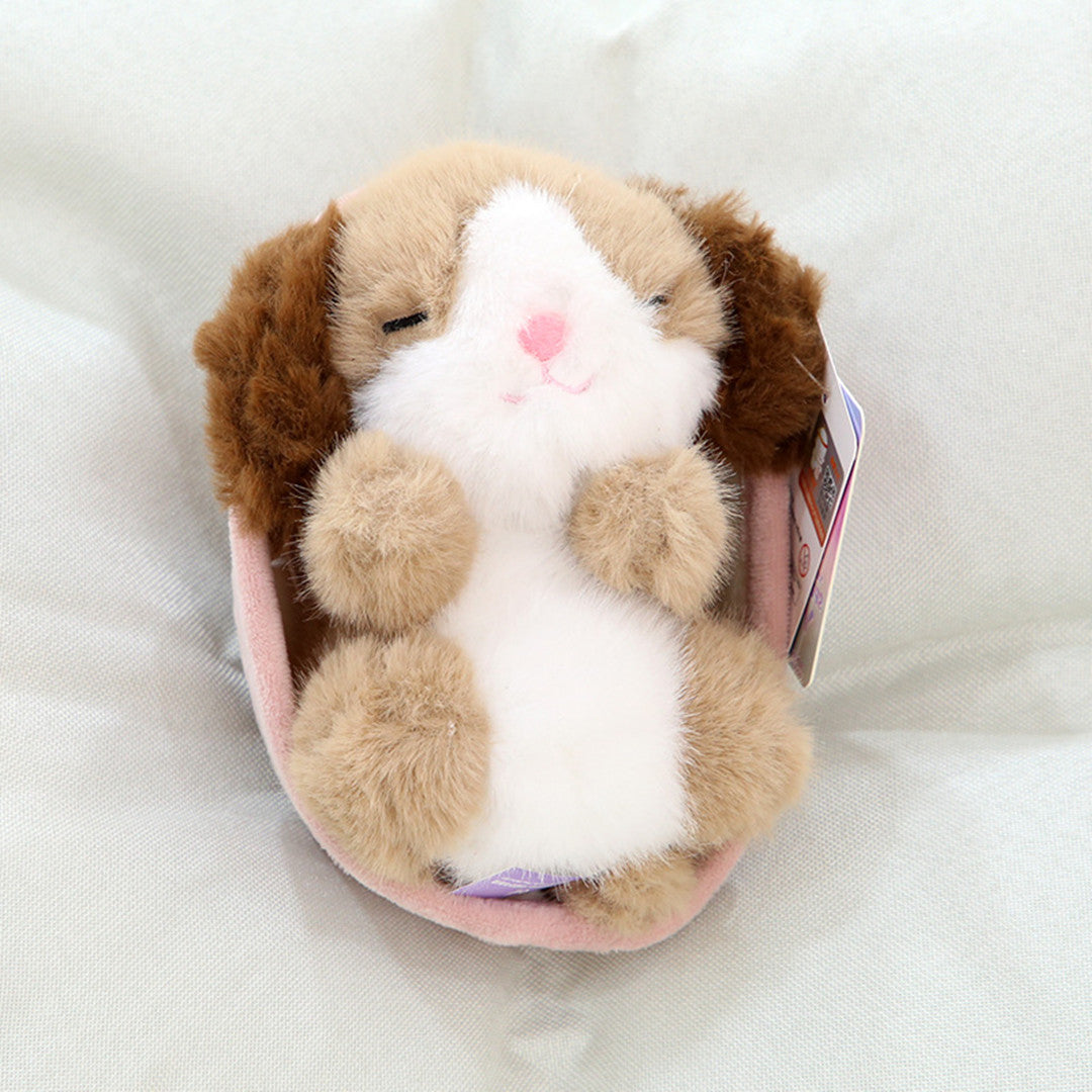 Peluche bébé animal dans un berceau